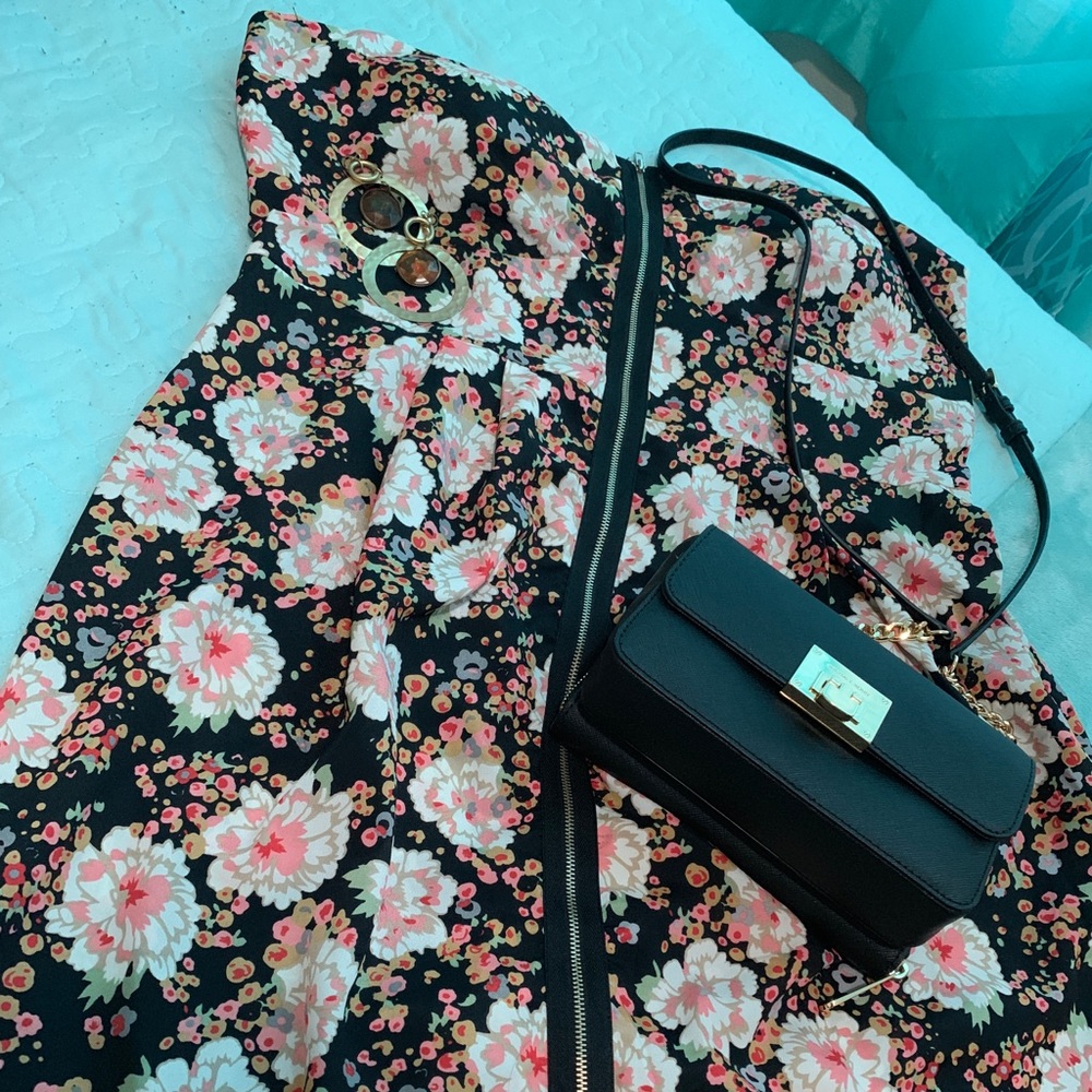 Floral strapless dress with exposed front zipper.
